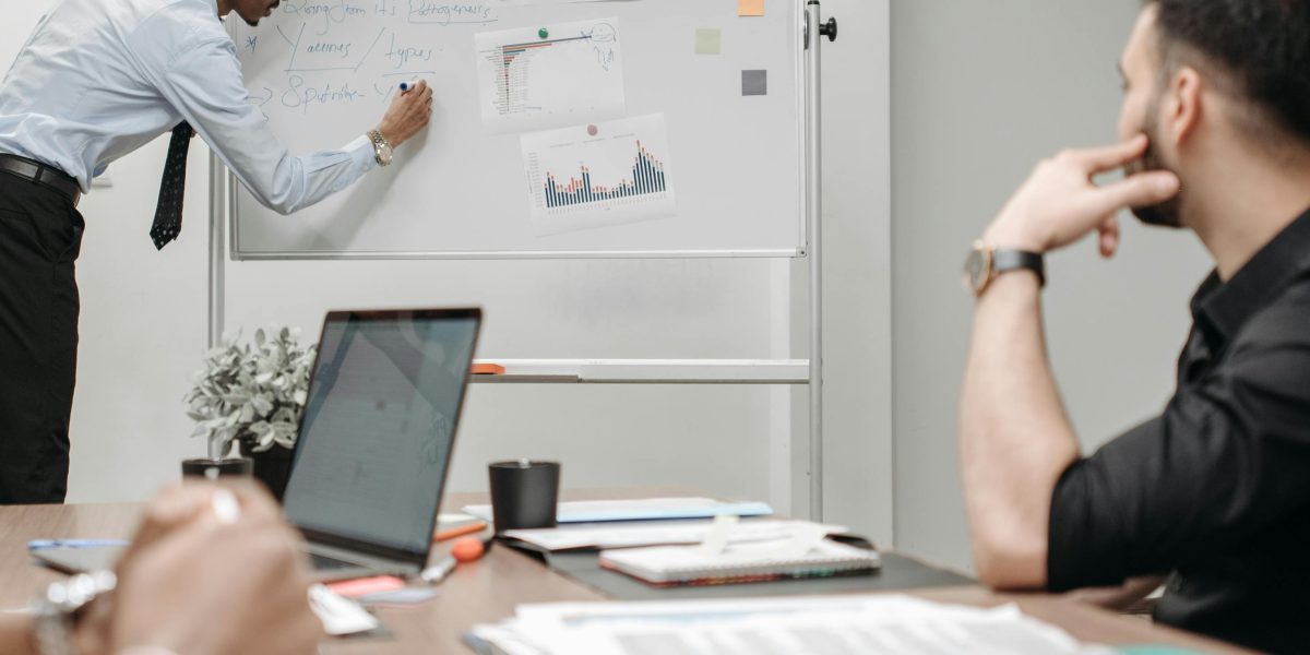 Professionals collaborating to establish trust and reliability in AI-generated content within a business setting.