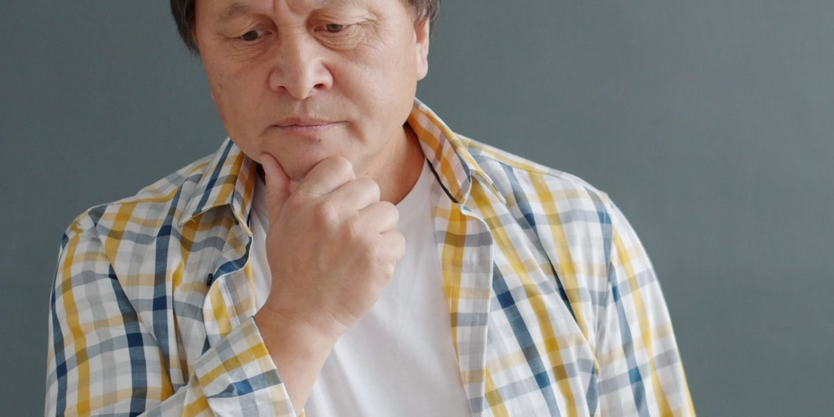 An individual thoughtfully reviewing information, enabled by centralized knowledge within a collaboration platform.