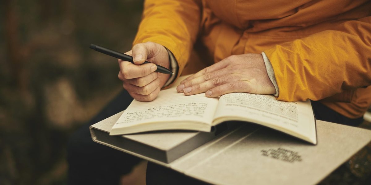 A person looking puzzled or frustrated while reviewing a document, symbolizing the discovery of incorrect information.