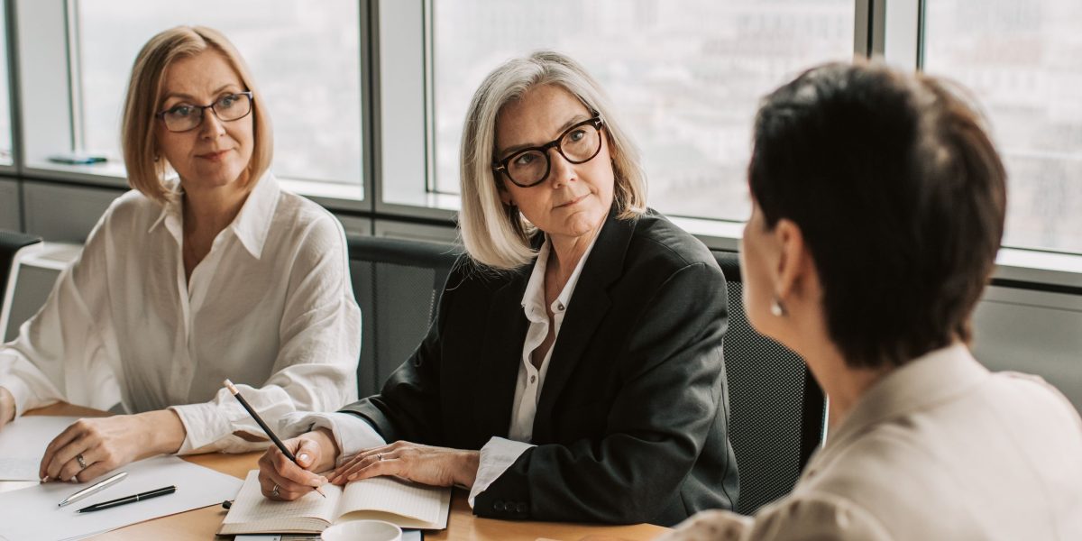 A team collaborates, planning strategically to ensure AI model success from the initial stages.