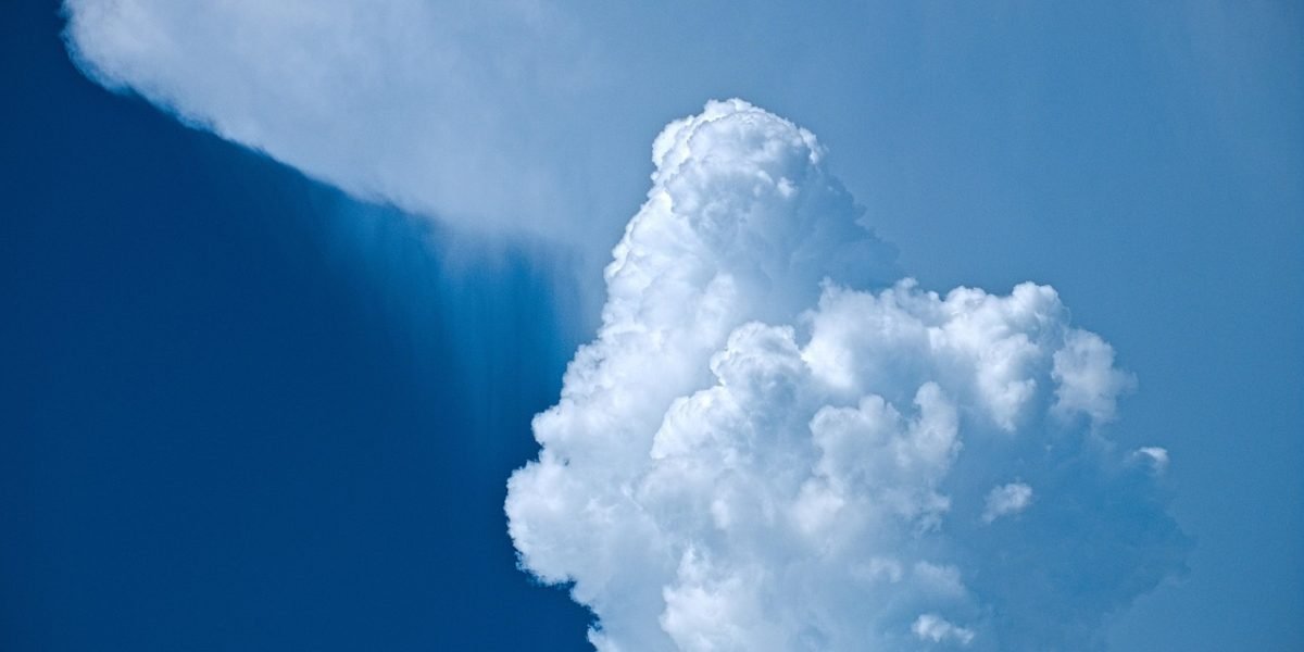 A professional analyzing potential security threats and misconfigurations in a cloud environment to protect AI systems.