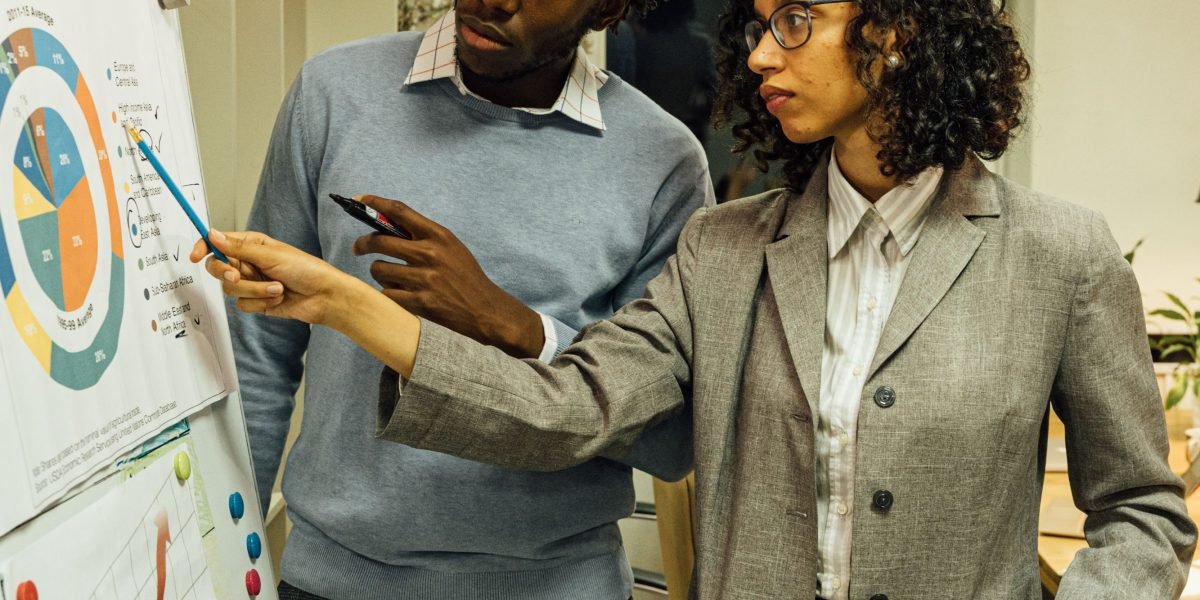 Professionals collaborating to define their company's data strategy, emphasizing in-demand skills.
