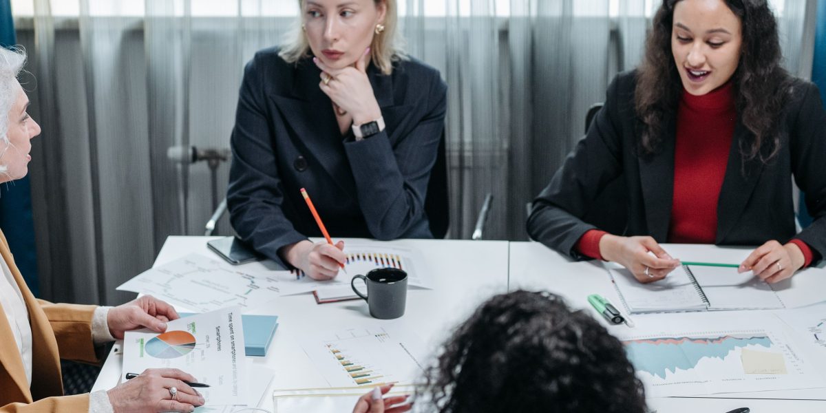 A leader effectively coordinating team efforts, akin to an orchestrator guiding a complex system.
