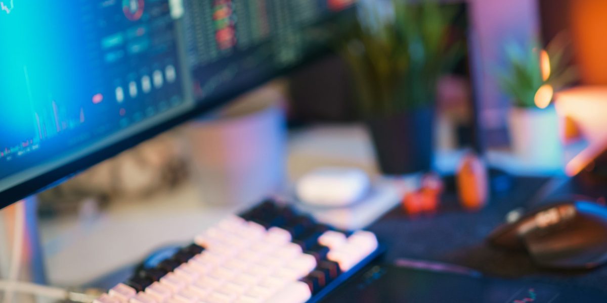 An individual carefully reviewing data to ensure the reliability and performance of AI systems.