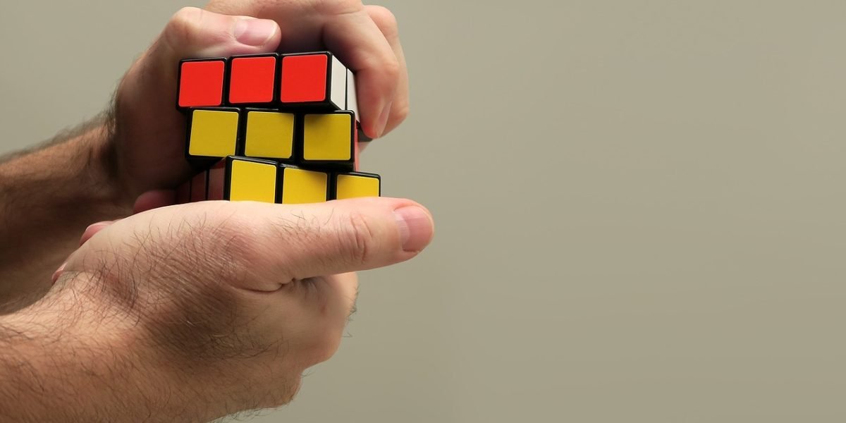 A team collaborates intensely, working to resolve an urgent problem related to an AI system failure or hallucination.