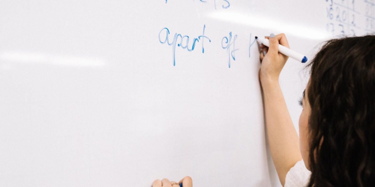 An individual focused on problem-solving, embodying the analytical skills crucial for AI cybersecurity.