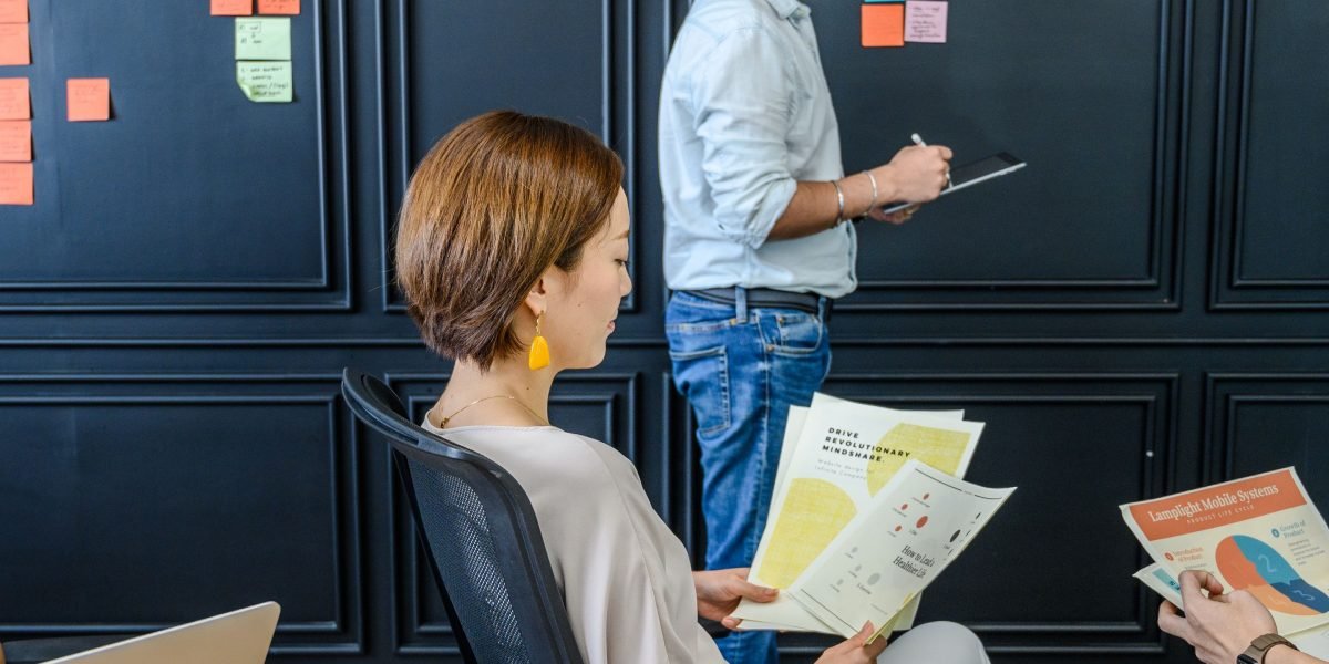 A team collaborates to strategize and implement robust cybersecurity measures for their AI projects.
